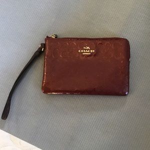 Maroon Coach wristlet🍁🍂